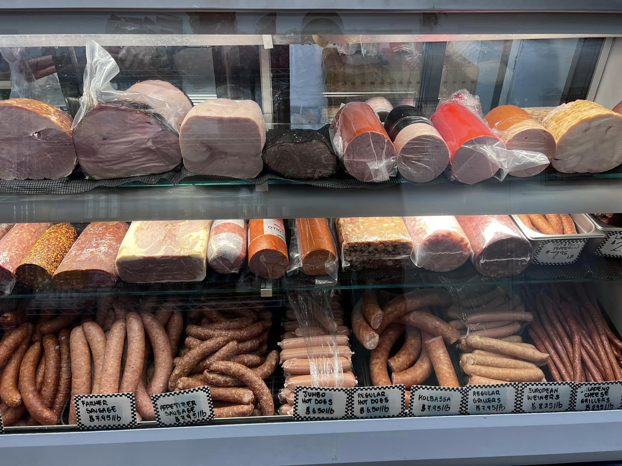 An assortment of deli meat on display
