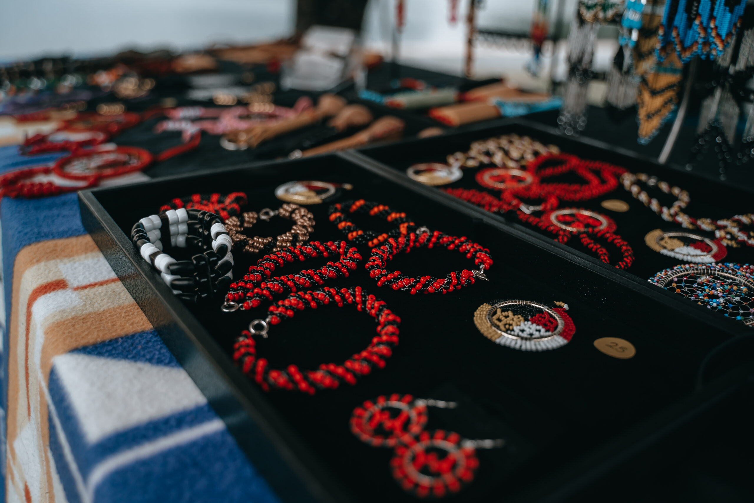 Indigenous jewellery on display on a table.