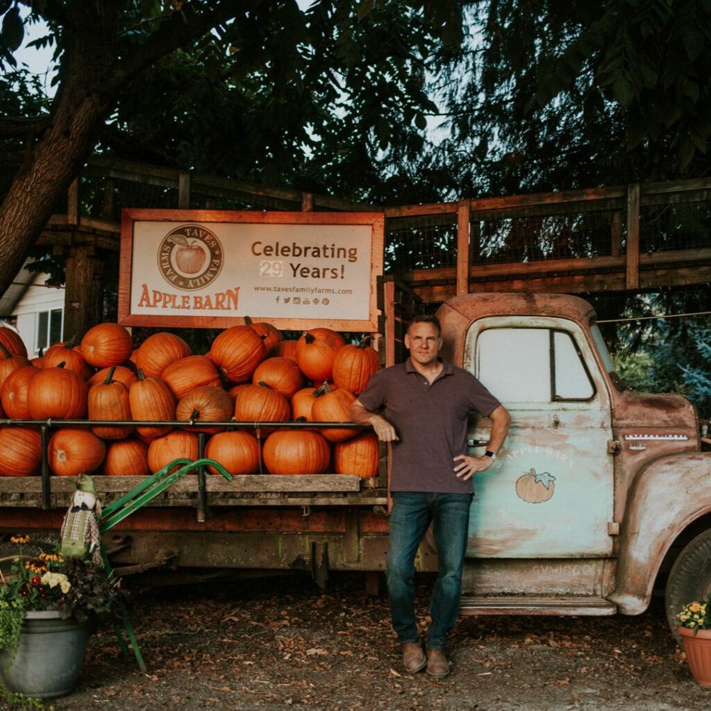 pumpkins and man with truck