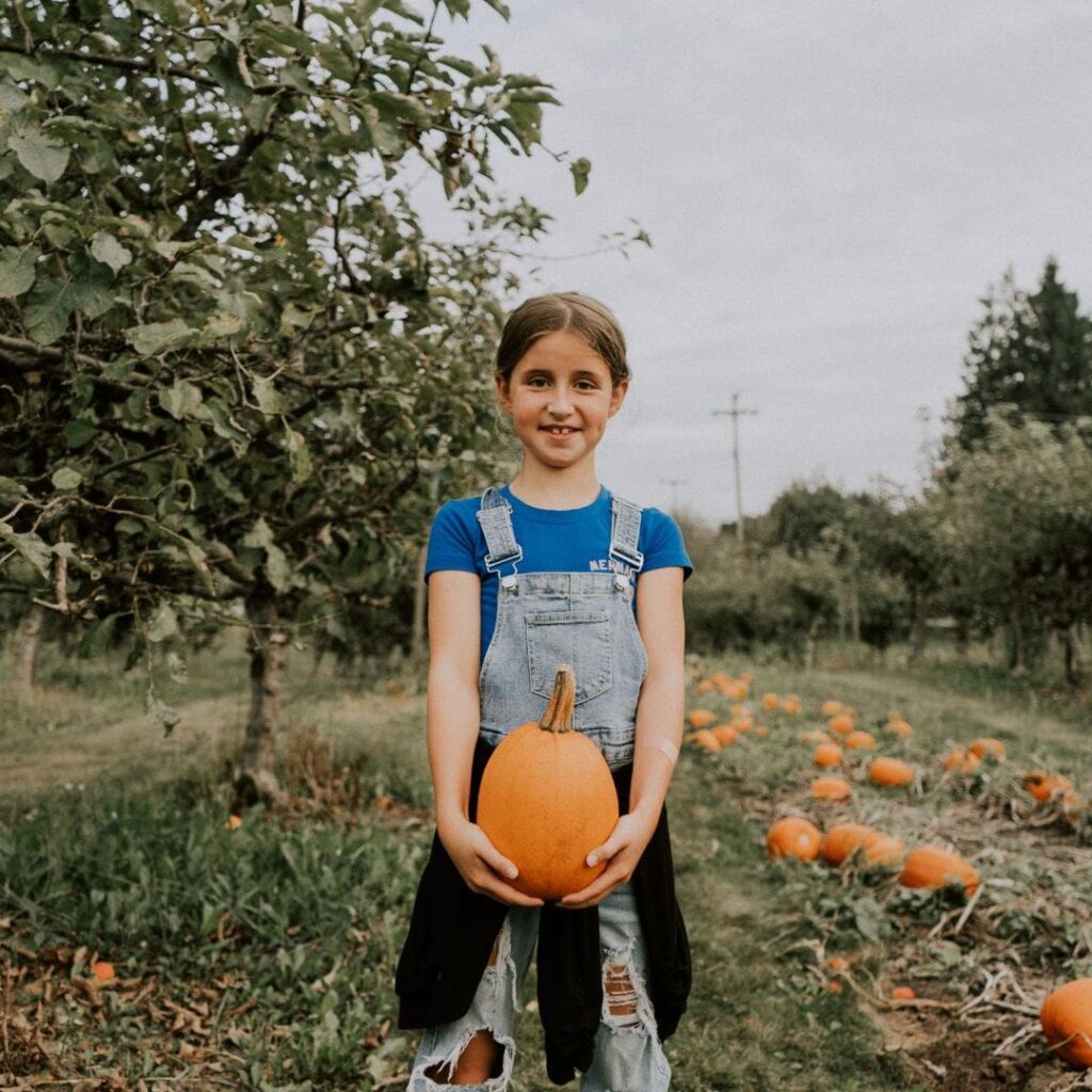 girl with pumpkin