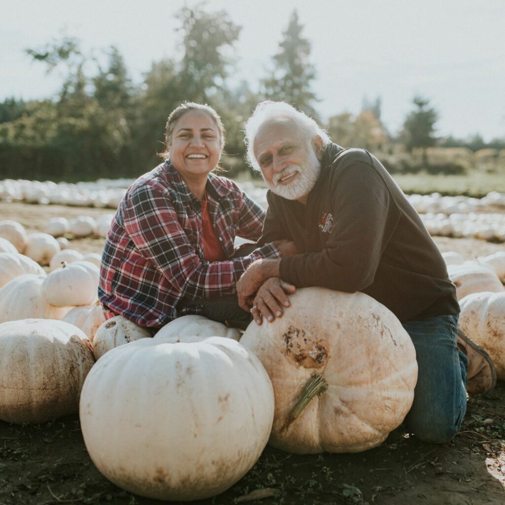 couple with white pumpkins