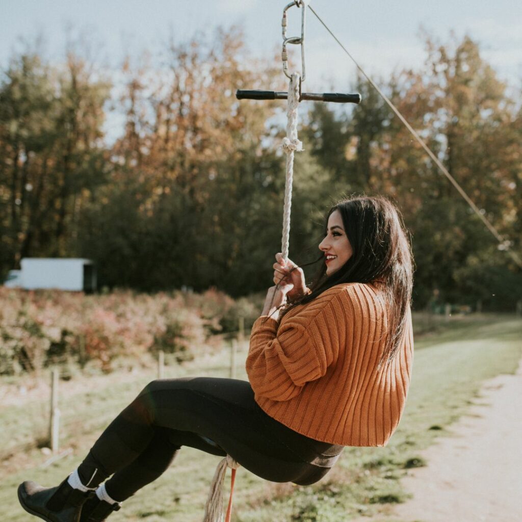 woman on rope zipline